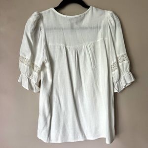 White linen blouse.